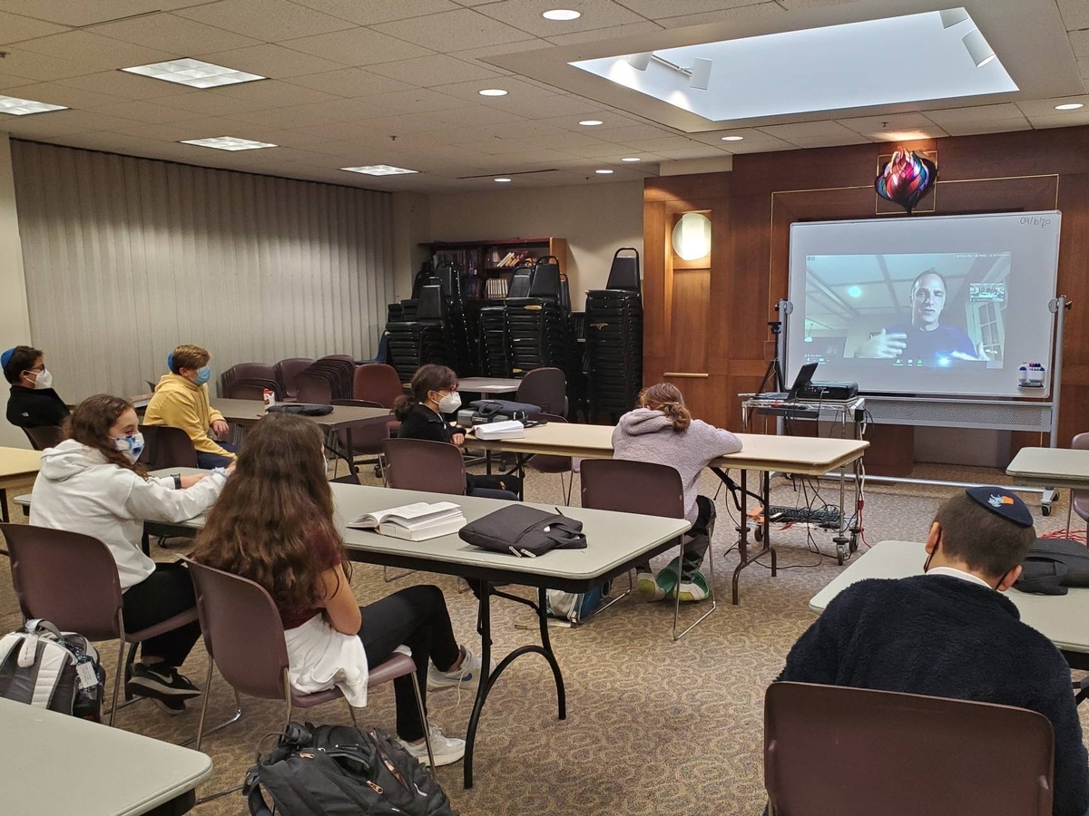 Adam Tilove teaching virtually during quarantine