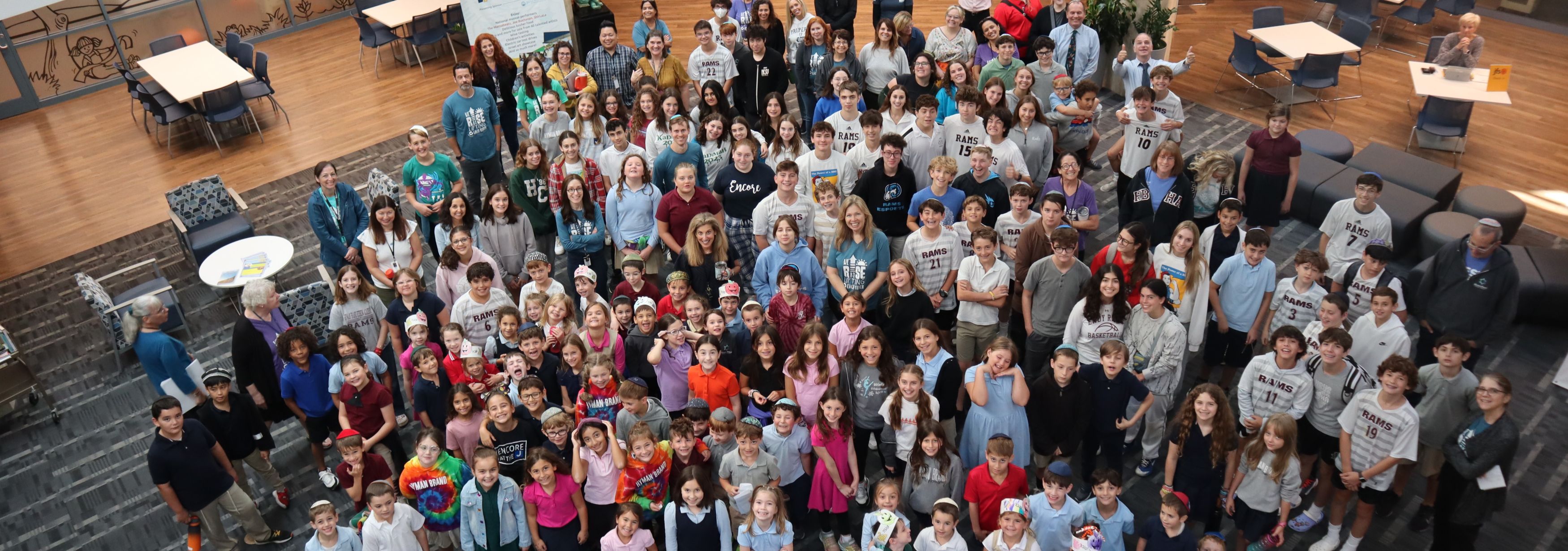 All HBHA students and staff smile together for a whole-school photo